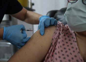 All Coloradans will have access to coronavirus vaccine by mid-April, governor says