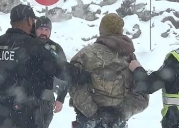 Man sprays Fire Extinguisher on Eisenhower Tunnel traffic