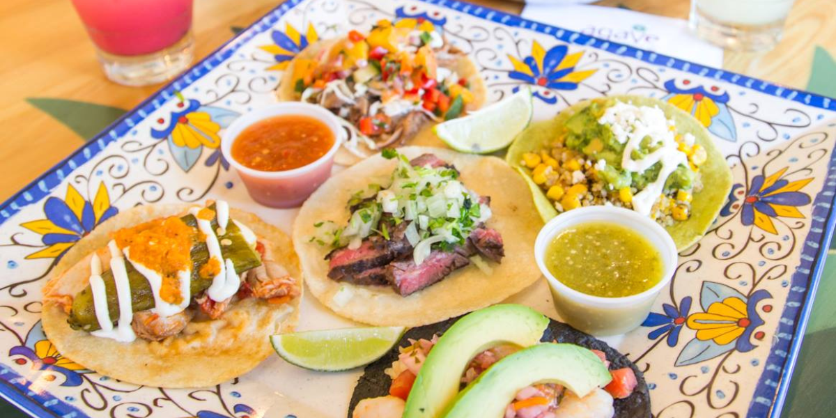 Agave Taco Bar is a trendy spot in the Highlands neighborhood of Denver and serves up tacos and tequila all week. Their tacos are a fusion of Mexican and American flavors, with options like the BBQ Brisket Taco and the Fried Chicken Taco. Agave Taco Bar is the place to go if you want a more upscale taco experience.