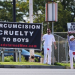 Standing outside Centura Health Primary Care in Thornton, Colorado, on April 6, two men dressed in all-white garb — except for a significant, blood-red mark on the crotch of their pants — faced traffic and held a large sign saying, "CIRCUMCISION PENIS MUTILATION."