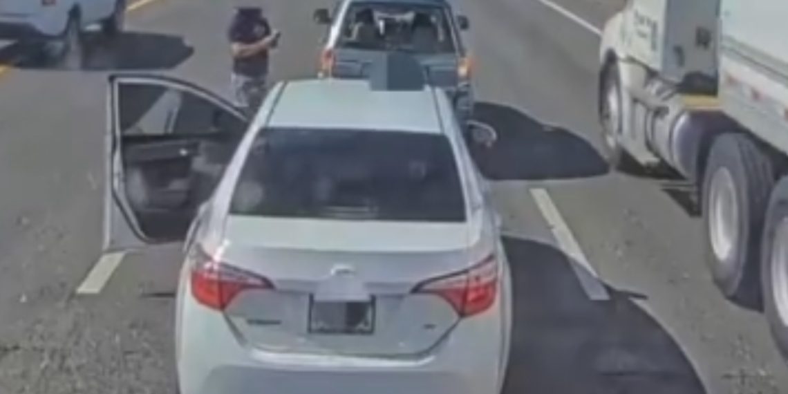 VIDEO Wild Freeway Fight Caught on Camera Ends With Shattered Window and Crowbar